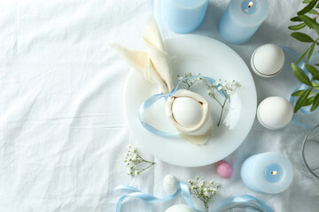 Fototapeta na wymiar Concept of Easter table setting, space for text