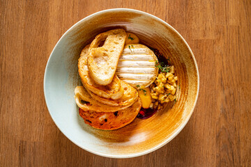 baked camembert with pear and toasts