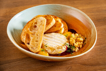 baked camembert with pear and toasts
