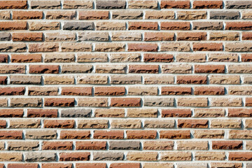 Brick construction with a mixture of brown and apricot colors
