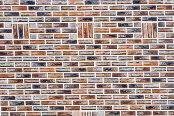 Red, gray and white mixed bricks constructed