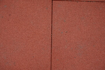 Fototapeta premium Dirty surface of brownish red EPDM synthetic rubber floor