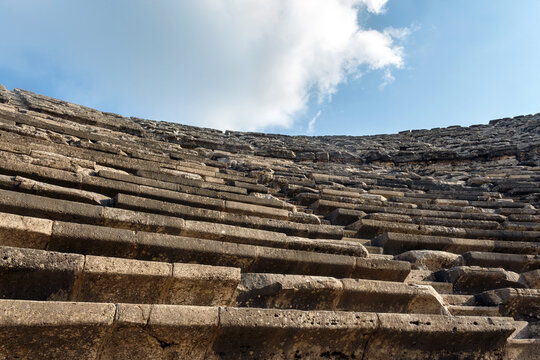 Marble Seats Of Ancient Theater In Side, Ruined Ancient City (Turkey, Antalya Region). Close Up View From Below