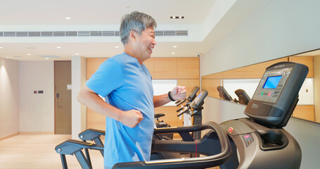 man running on treadmill