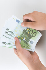 Savings, finances, economy and home concept .Man counting euro.Crisis after the covid-19 epidemic .Euro falling or rising.