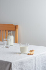 Fresh Milk on the table with white tablecloth