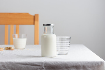 Fresh Milk on the table with white tablecloth