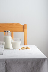 Fresh Milk on the table with white tablecloth
