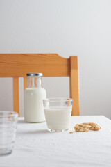 Fresh Milk on the table with white tablecloth