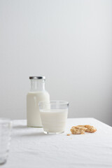 Fresh Milk on the table with white tablecloth