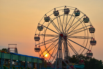 Beautiful view of the ferris wheel against the twilight sky. Sundowning view. Tamil Nadu, India.