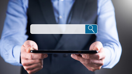 Man hands and tablet (PC). Concept of search in internet