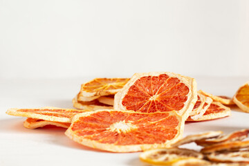 Dried grapefruit slices. Bright juicy ripe fruits.