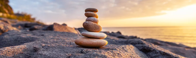 Peel and stick wall murals Spa Stones pyramid on the seashore at sunset