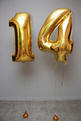 birthday balloons with golden numbers