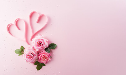 Happy Women's Day decoration concept made from rose flower and heart on pink pastel background.