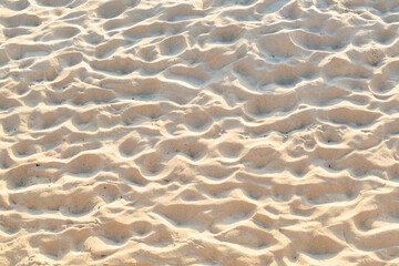 Fine beach sand in the summer sun