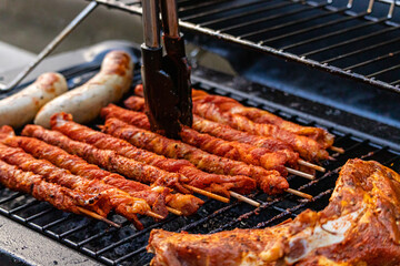 gas grill with grilled meat grill tongs 