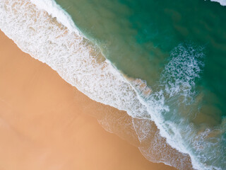 Nature and travel concept video beach sea Aerial view Top-down shot on drone camera high quality. Tropical sea beach in island on 2022. Location: Phuket Thailand