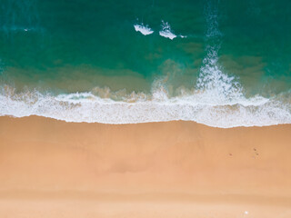 Nature and travel concept video beach sea Aerial view Top-down shot on drone camera high quality. Tropical sea beach in island on 2022. Location: Phuket Thailand