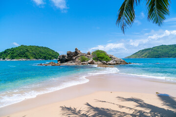 Summer beach sea with island in summer sun blue sky background.