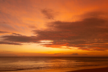 Naklejka na ściany i meble Beautiful Sunset tropical beach sea in Phuket Thailand.