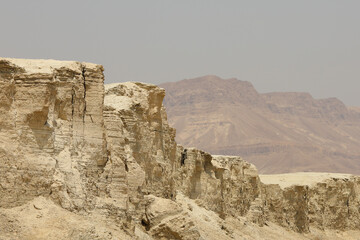 Rocky hills of the Negev Desert in Israel. Breathtaking landscape and nature of the Middle East at sunset. High quality photo