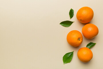 fresh Fruit orange slices on colored background. Top view. Copy Space. creative summer concept. Half of citrus in minimal flat lay with copy space