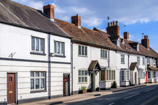 England UK. Traditional houses and cottages in an English Village. Suitable for articles on housing market, finance, mortgage, cost of living etc. Generic property image.