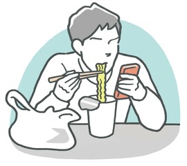 携帯電話を触りながらカップラーメンを食べる男性
