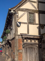 Obraz premium England UK. Traditional houses and cottages in an English Village. Suitable for articles on housing market, finance, mortgage, cost of living etc. Generic property image.