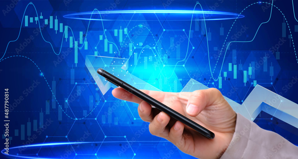Poster hologram of a forex chart sketch and a woman carrying and using a mobile device are seen in a double