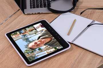 Closeup of a woman talking through video chat on tablet. communicating tablet in video chat through...