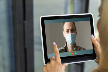 Close-up Of A Young man Chatting With Her Colleague