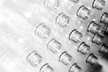 Bottling plant - Plastic bottles. Abstract background of plastic bottles. Selective focus