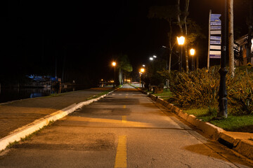 bike path at night illuminated by public light