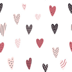 Seamless pattern design with colorful hearts in boho style.  Romantic background. Great for fabric, textile, apparel.
