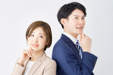 ビジネスウーマンとビジネスマン　考える　白背景