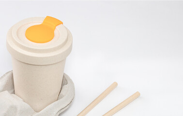  Reusable bamboo coffe cup on white background 