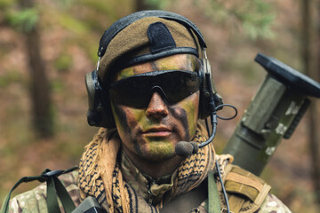 Uber cool macho tough soldier posing for a profile . High quality photo