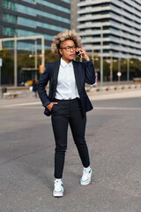 Beautiful African american businesswoman talking on the phone