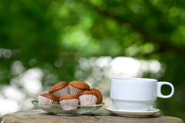 cup of coffee with cookies
