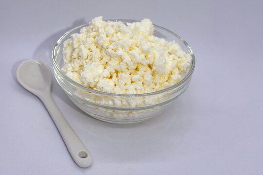 homemade cottage cheese on a light background