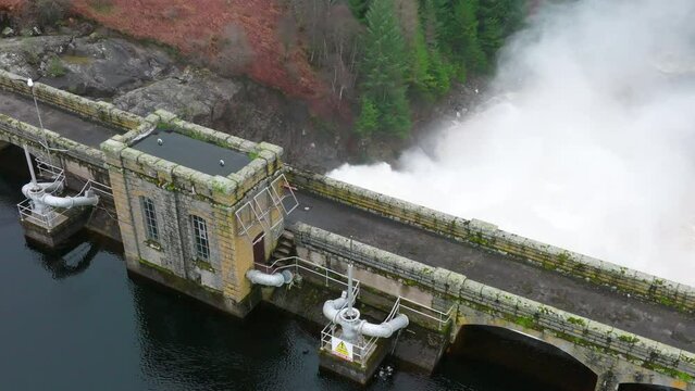 Water Being Pumped Through a Gravity Fed Hydroelectric Power Station Dam