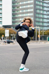 Portrait of business african american girl in fighting pose. Hard business concept