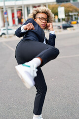 Portrait of business african american girl in fighting pose. Hard business concept