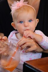 baby child drinking juice