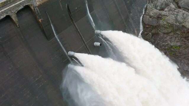 Water Being Pumped Through a Gravity Fed Hydroelectric Power Station Dam