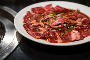 Sliced raw beef. Sliced ​​meat for cooking, fresh meat for grilling, yakiniku