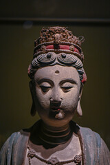 Close up of Guanyin Bodhisattva statue in ancient Buddhist temples in China